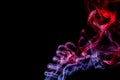 Abstract red - blue smoke from aromatic sticks. Royalty Free Stock Photo