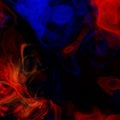 Abstract red blue smoke swirls on black background Royalty Free Stock Photo