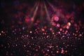 Abstract red Christmas glowing background with shiny defocused lights, bokeh Royalty Free Stock Photo