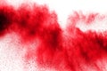 Abstract red dust splattered on white background. Red powder explosion Royalty Free Stock Photo