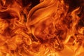 Abstract red fire natural background with blaze. Beautiful dangerous firestorm abstract texture Royalty Free Stock Photo