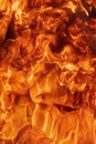 Abstract red fire natural background with flames. Beautiful dangerous firestorm abstract texture