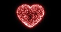 Abstract red fireworks festive fireworks for valentine`s day in the shape of a heart from glowing particles and magical energy Royalty Free Stock Photo