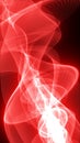 Abstract red flowing lines creating luminous energy waves and dynamic motion on a dark background Royalty Free Stock Photo