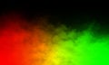 Abstract red and green smoke mist fog on a black background. Royalty Free Stock Photo