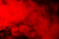 Abstract red-orange smoke hookah on a black background. Royalty Free Stock Photo