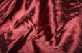 Abstract red pink creasy velvet fabric background texture. beautiful luxurious fabric for draperies, curtains, bed cover, love Royalty Free Stock Photo