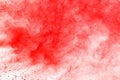 Abstract of red powder explosion on white background. Red powder splatted isolate. Colored cloud. Colored dust explode. Paint Holi Royalty Free Stock Photo