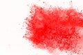 Abstract of red powder explosion on white background. Red powder splatted isolate. Colored cloud. Colored dust explode. Paint Holi Royalty Free Stock Photo