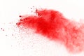 Abstract of red powder explosion on white background. Red powder splatted isolate. Colored cloud. Colored dust explode. Paint Holi Royalty Free Stock Photo