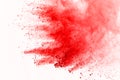 Abstract of red powder explosion on white background. Red powder splatted isolate. Colored cloud. Colored dust explode. Paint Holi Royalty Free Stock Photo