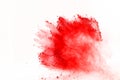 Abstract of red powder explosion on white background. Red powder splatted isolate. Colored cloud. Colored dust explode. Paint Holi Royalty Free Stock Photo