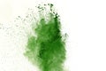 Abstract Red powder splatted background,Freeze motion of red powder exploding/throwing green dust. Royalty Free Stock Photo