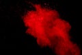 Abstract Red powder splatted background,Freeze motion of red powder exploding/throwing green dust Royalty Free Stock Photo