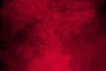 Abstract red smoke on black background. Dramatic red smoke clouds. Royalty Free Stock Photo