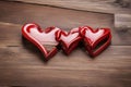 abstract Red Wooden Interlocking Hearts With High Gloss Finish On Rustic Wood Royalty Free Stock Photo