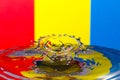 Abstract red, yellow and blue water drop collision Royalty Free Stock Photo