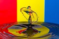 Abstract red, yellow and blue water drop collision Royalty Free Stock Photo