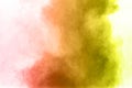 Abstract red yellow color powder explosion on white background Royalty Free Stock Photo