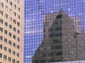 Abstract, reflection of buildings on glass surface