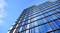 Abstract reflection of modern city glass facades.