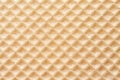 abstract relief golden waffle texture, background for your design. Royalty Free Stock Photo