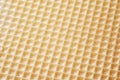 abstract relief golden waffle texture, background for your design. Royalty Free Stock Photo