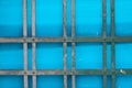 Abstract rendering of metal bars and blue plastic