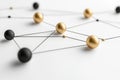Abstract representation of interconnected nodes and metallic spheres symbolizing complex networking data transfer and advanced