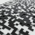 An abstract representation of a QR code with raised black squares on a reflective whit Royalty Free Stock Photo
