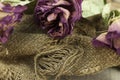 Abstract rose bouquet, Bouquet of dried flowers on old burlap texture Royalty Free Stock Photo