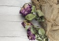 Abstract rose bouquet, Bouquet of dried flowers on old burlap texture Royalty Free Stock Photo