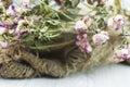 Abstract rose bouquet, Bouquet of dried flowers on old burlap texture Royalty Free Stock Photo