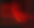 Abstract Ruby Gradient: A Mesmerizing Deep Red and Black Grainy Background with Subtle Light Emanating Royalty Free Stock Photo
