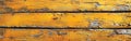 Abstract Rustic Wooden Texture: Yellow Orange Painted Grain for Walls, Floors or Tables - Grunge Wood Background Banner Royalty Free Stock Photo