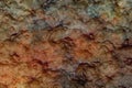 Abstract rusty brown marbled stone, cracked sheet dirty background with stains parts. Shabby material