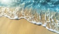 abstract sand beach from above with light blue transparent water wave and sun lights Royalty Free Stock Photo