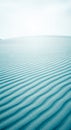 Abstract Sand Dunes with Turquoise Tint and Wavy Patterns Royalty Free Stock Photo