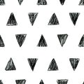 Abstract scandinavian pattern with black polka dot triangles.