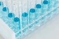 Abstract of Scientific Test Tubes Containing Blue Chemical In Rack Royalty Free Stock Photo