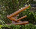 Abstract sculpture of wooden beams and blocks in the Museo del Parco in Portofino, Italy