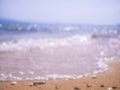 Abstract sea background. Abstract sandy summer beach background with bokeh lights on light blue sky. Beautiful texture. Space Royalty Free Stock Photo