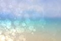 Abstract sea background. Abstract tropical sandy summer beach background with bokeh lights on light blue sky and sun. Beautiful Royalty Free Stock Photo