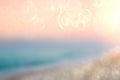 Abstract sea background. Abstract tropical sandy summer beach background with bokeh lights on light blueorange sky and sun. Royalty Free Stock Photo