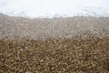 Sea pebbles. Natural composition background. Waves pebbles and sea