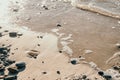 Abstract sea summer ocean sunset nature background. Small waves on golden water surface in motion blur with golden bokeh Royalty Free Stock Photo