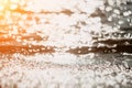 Abstract sea summer ocean sunset nature background. Small waves on golden water surface in motion blur with golden bokeh Royalty Free Stock Photo