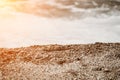 Small sea wave, Blurred Soft foamy waves washing golden sandy beach on sunset. Ocean Waves On Sandy Beach. Nobody Royalty Free Stock Photo