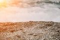 Small sea wave, Blurred Soft foamy waves washing golden sandy beach on sunset. Ocean Waves On Sandy Beach. Nobody Royalty Free Stock Photo