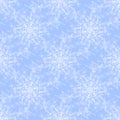 Regular seamless snowflakes pattern white on light blue Royalty Free Stock Photo